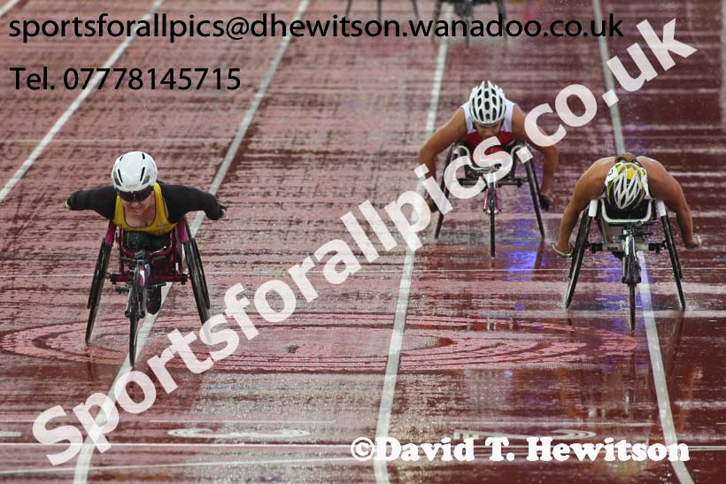 Angela Ballard (Australia) wins from Diane Roy (Canada) in the womens Para-Sport 1500 metres T54  at the Commonwealth Games, Glasgow. Photo: David T. Hewitson/Sports for All Pics